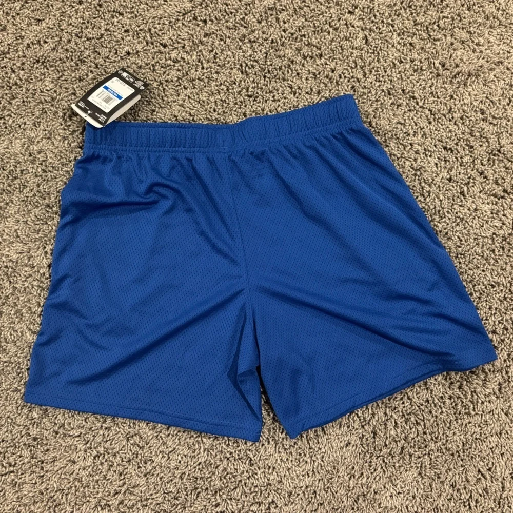 NWT boys Under Armour Athletic Shorts in Royal Blue, size XL.